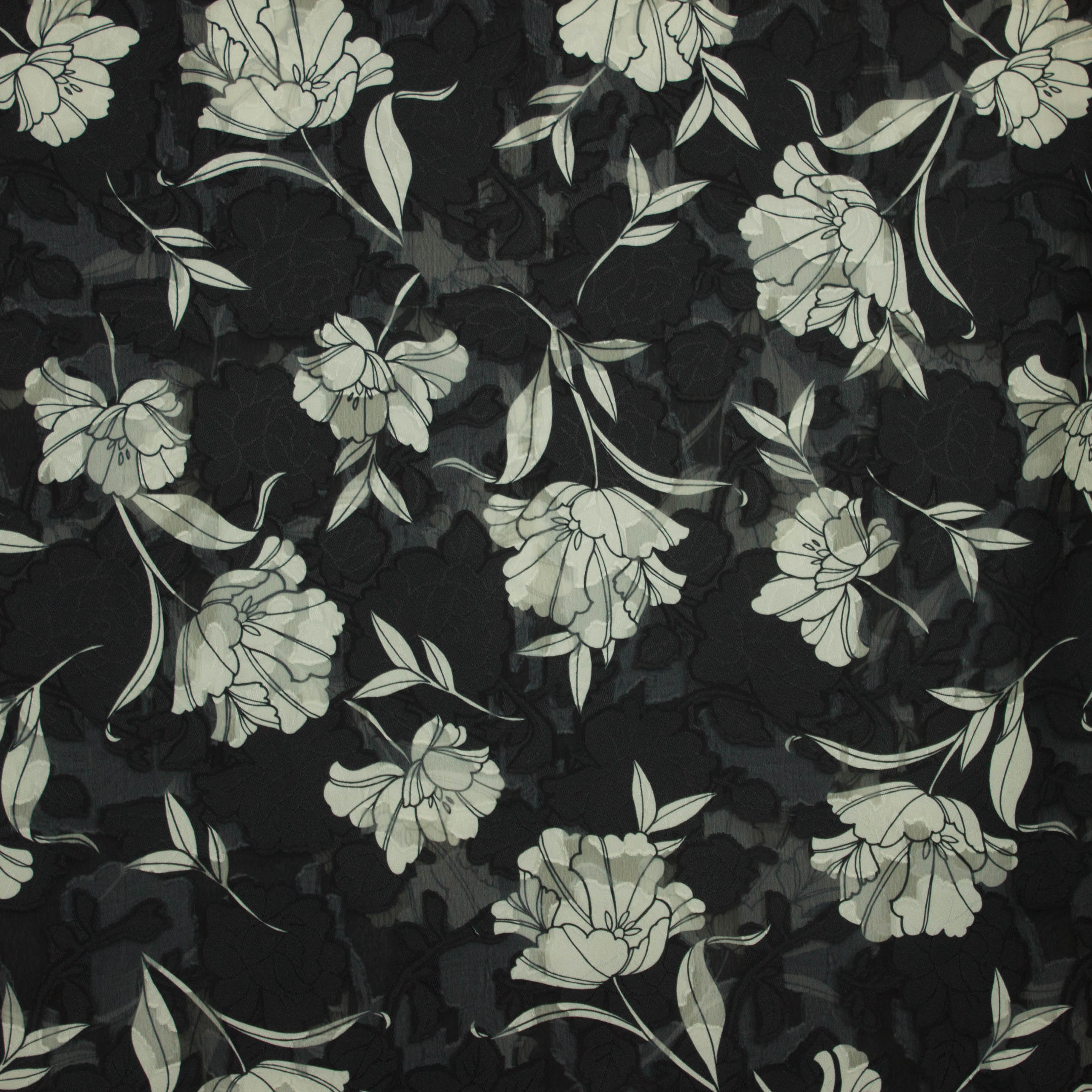 Voile zwart jacquard met witte bloemen